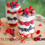 triple berry parfaits in glass jars