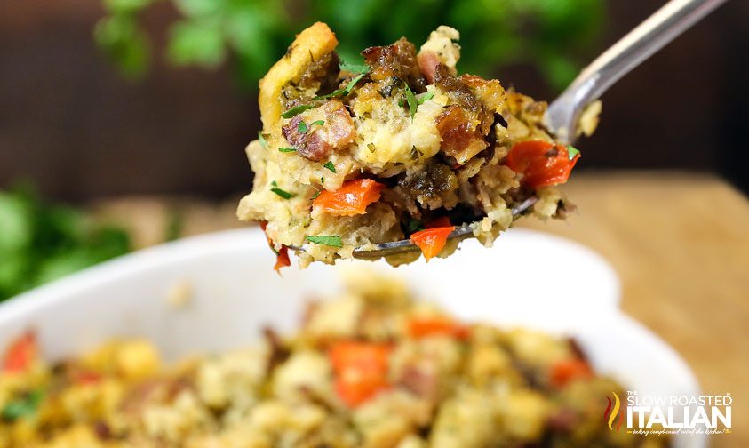 sausage and herb stuffing close up on a spoon