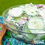 creamy cucumber salad in glass bowl