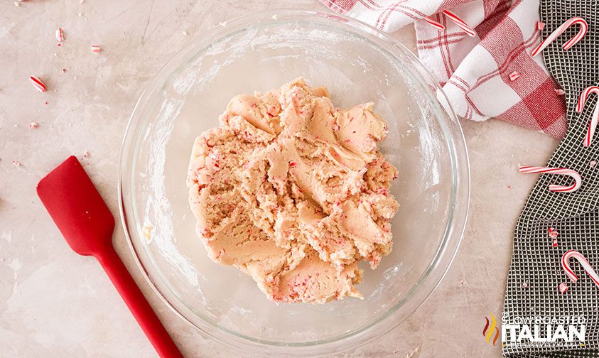 overhead: crushed candy canes mixed into sugar cookie dough