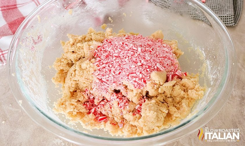 bowl with sugar cookie dough and crushed candy canes