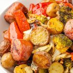 plate of air fryer sausage with potatoes and vegetables