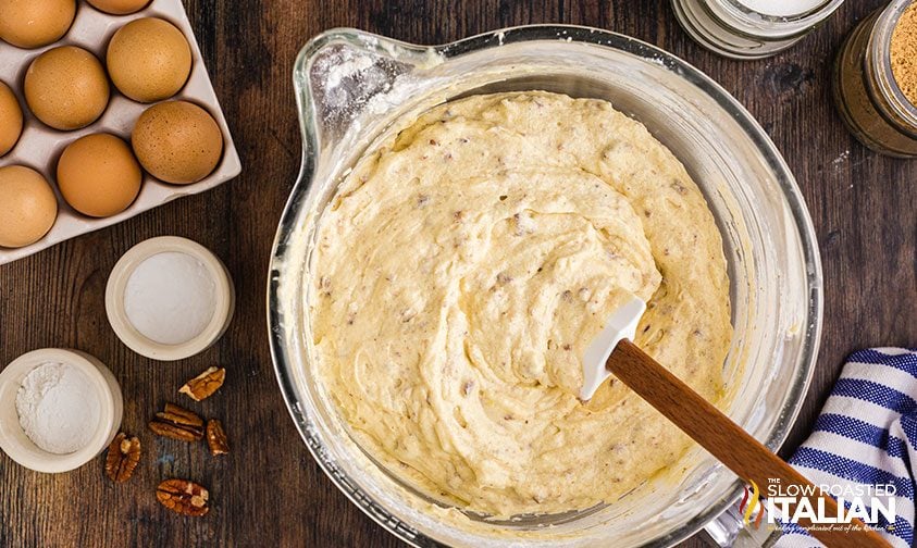 stirring cake batter in bowl