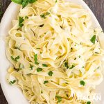 fresh homemade fettucine in white bowl