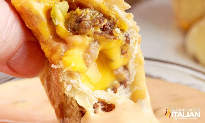 close up: pulling apart cheeseburger bomb