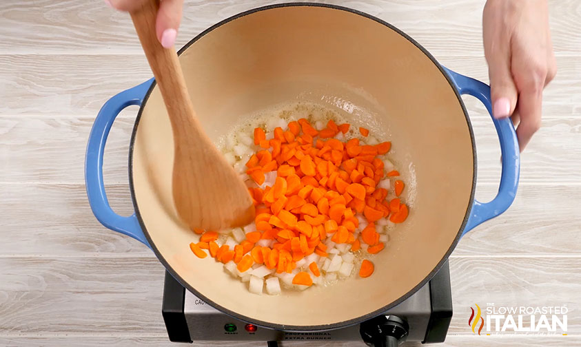 cooking carrots and oinion.