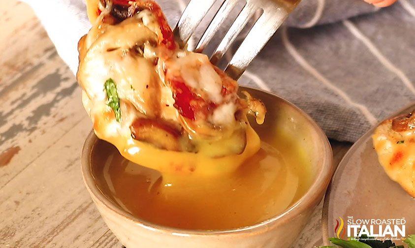 dipping Alice Springs chicken in honey mustard sauce