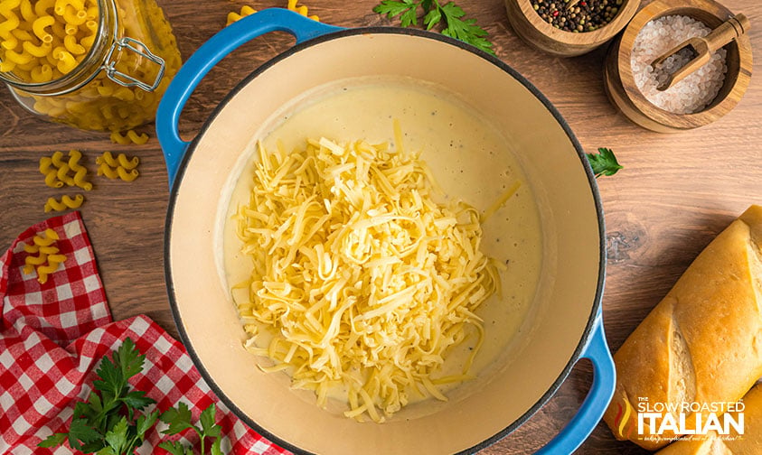 adding cheese to heavy bottom pot