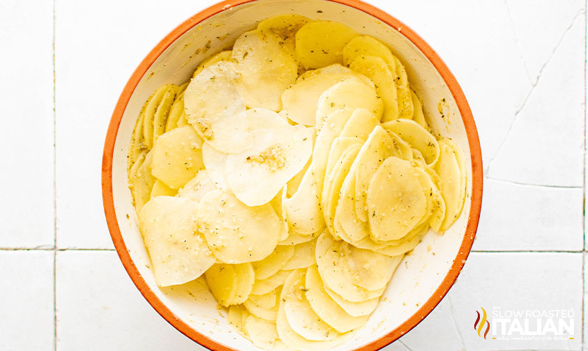 potato slices with mixture poured over it