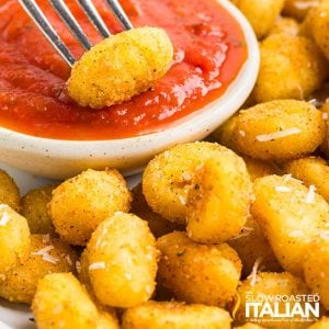 air fryer gnocchi dipped in red sauce