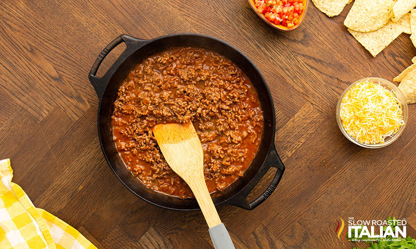 enchilada sauce mixed into cooked ground beef