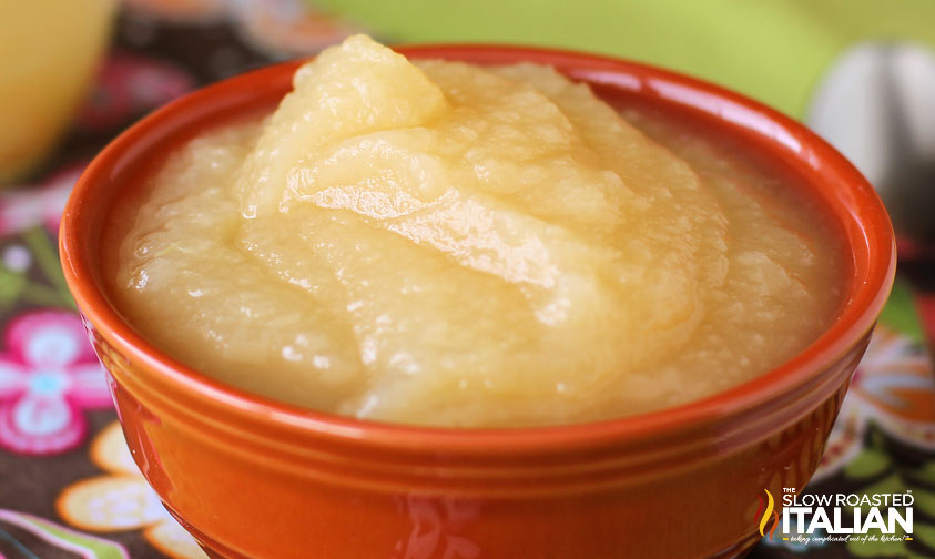 closeup of a red bowl full of unsweetened apple sauce