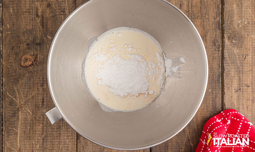 maple whipped cream ingredients in a mixing bowl