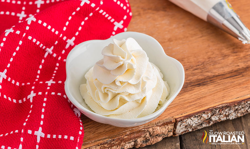 piped maple whipped cream in a white bowl