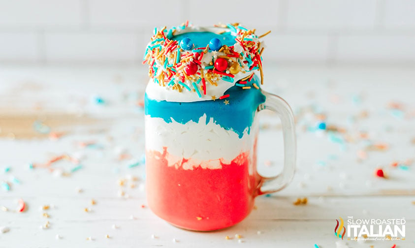blue layer of freakshake add to a glass
