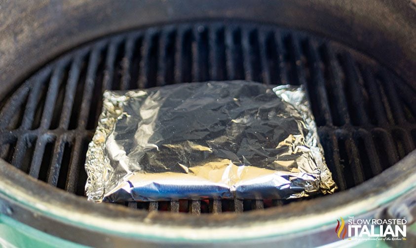 foil packet of potatoes on grill