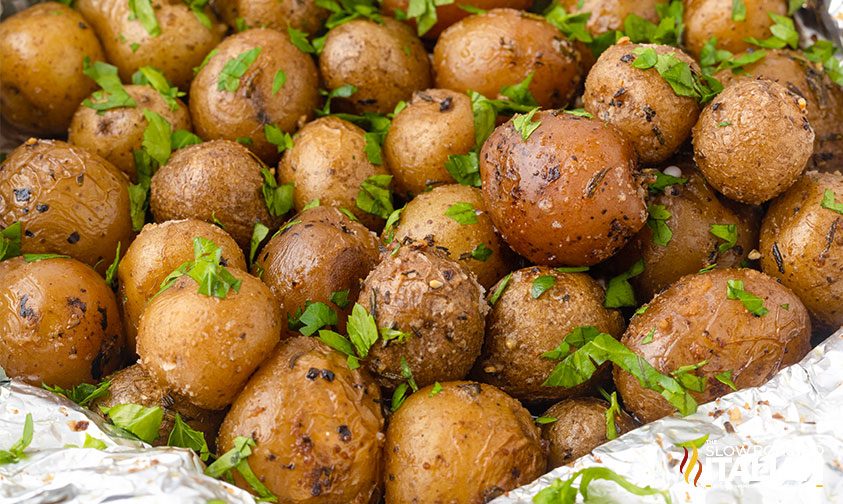 grilled rosemary potatoes with fresh parsley in foil packet