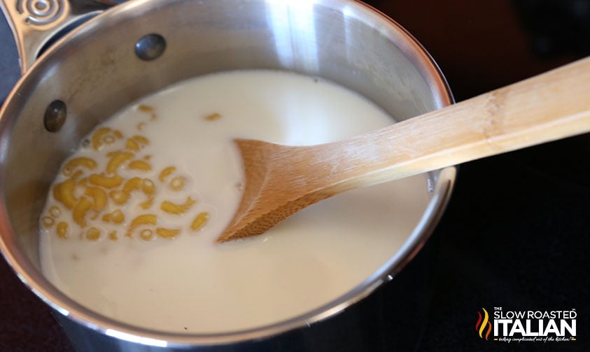 milk and pasta in a sauce pan