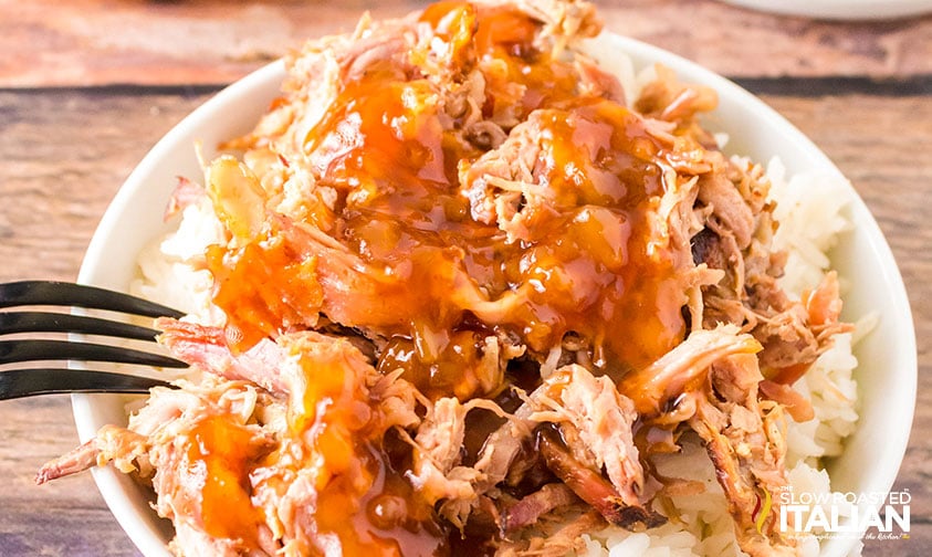closeup of pineapple barbecue sauce on shredded chicken and rice
