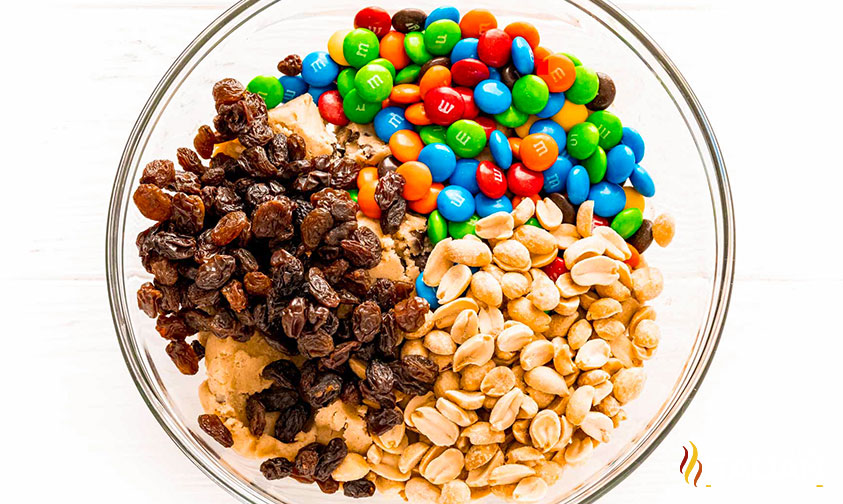 m&m's, peanuts and raisins added to trail mix cookie dough