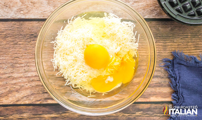 cheese, eggs and salt added to a mixing bowl