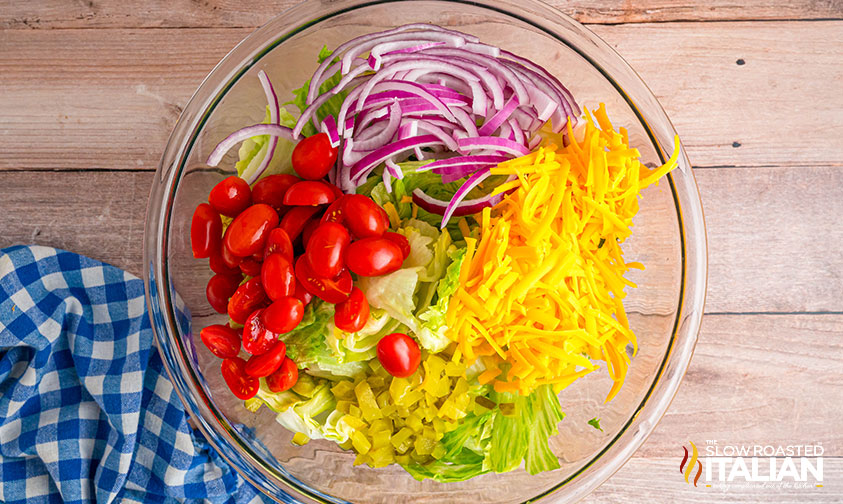 big mac salad recipe ingredients in a large mixing bowl