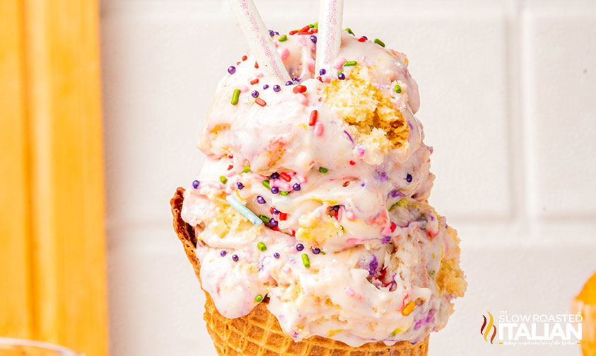 birthday cake ice cream in a waffle cone