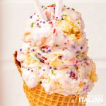 birthday cake ice cream in a waffle cone