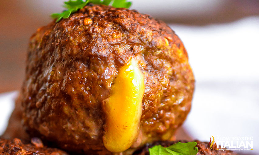 closeup of a cheesy stuffed taco meatball