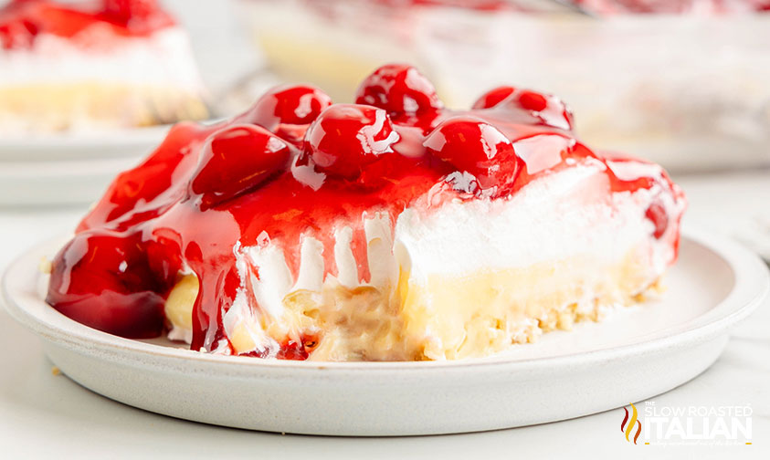 sideview of cherry cheesecake dessert