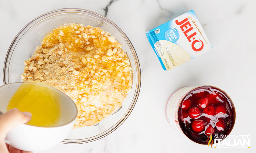 crushed wafers and melted butter in a large mixing bowl