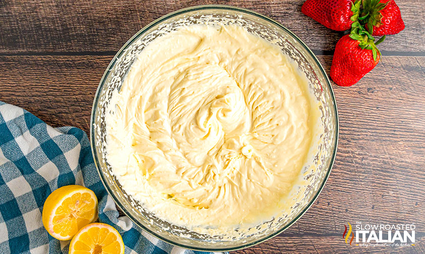 cheesecake batter mixed in a large mixing bowl