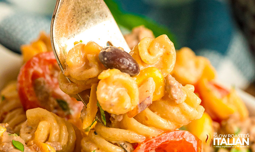 closeup of cowboy pasta salad on a fork