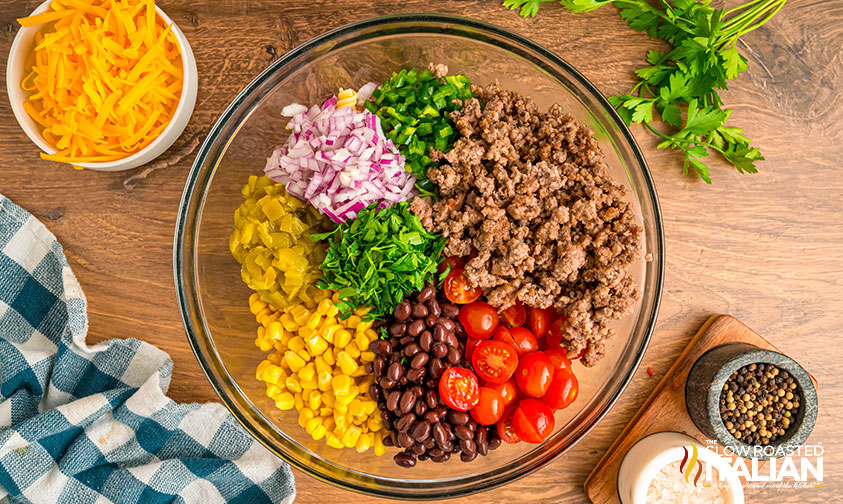 cowboy pasta salad ingredients in a large mixing bowl