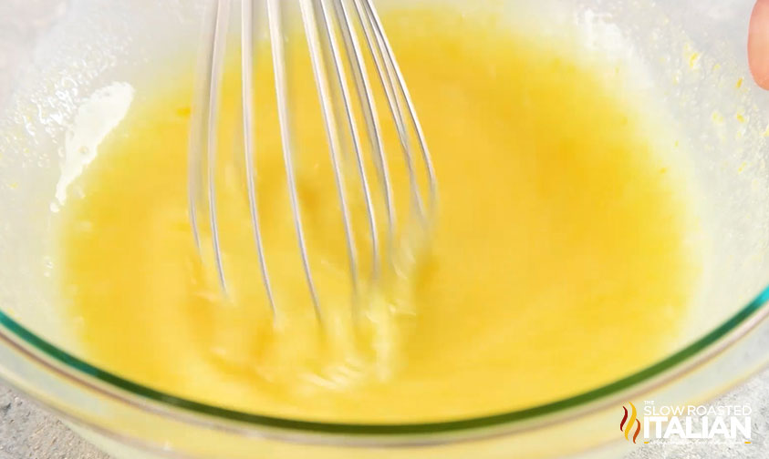 mixing lemon mixture for best lemon bar recipe