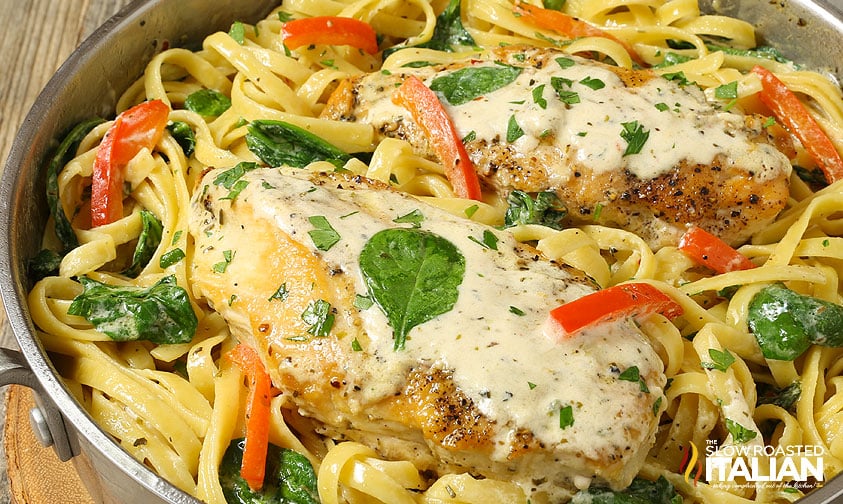 Tuscan chicken with pasta in skillet