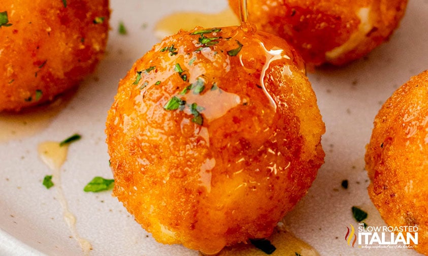 closeup of goat cheese balls on a plate