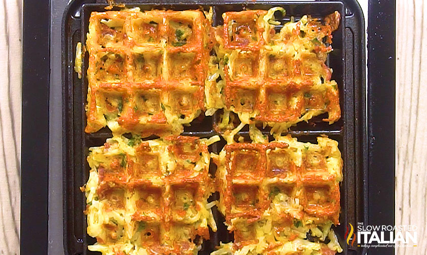 cooked cheesy hashbrown waffles in waffle cooker