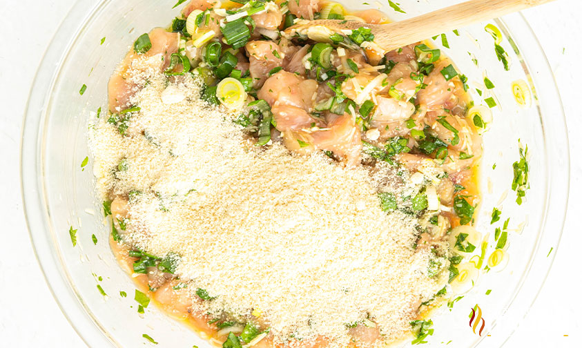 egg and shredded cheese added to large mixing bowl