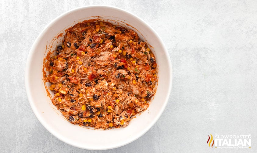 filling for chicken taco casserole in a mixing bowl