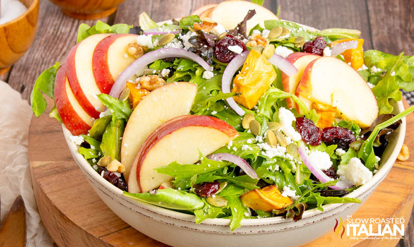 bowl of fall harvest salad on a wooden serving tray