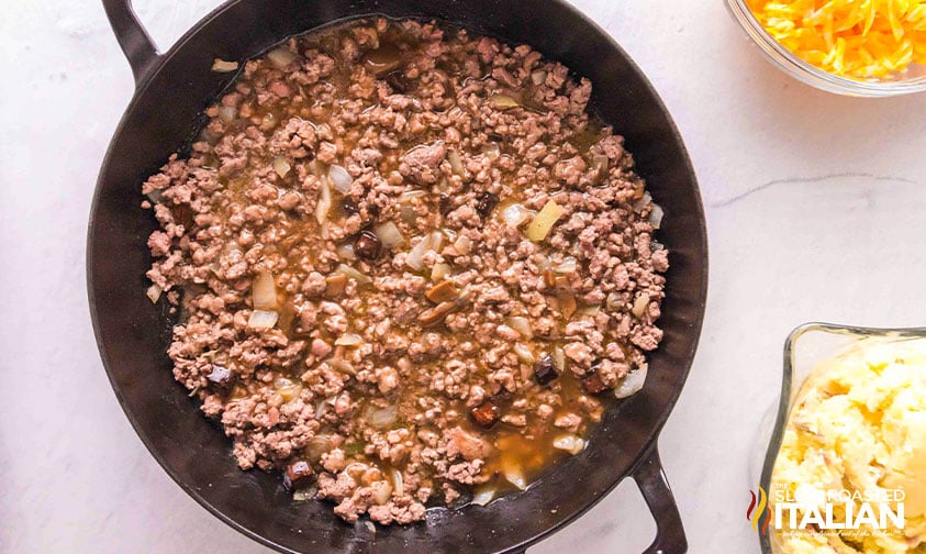 adding mushroom soup to browned ground beef