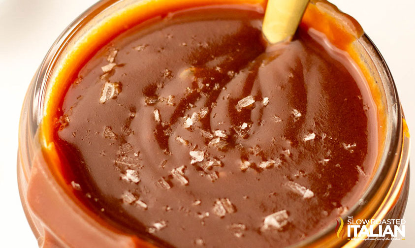 closeup of homemade salted caramel sauce in a har