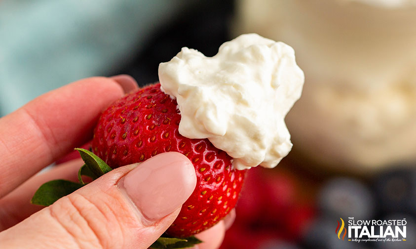 fresh strawberry dipped in keto cheesecake fluff