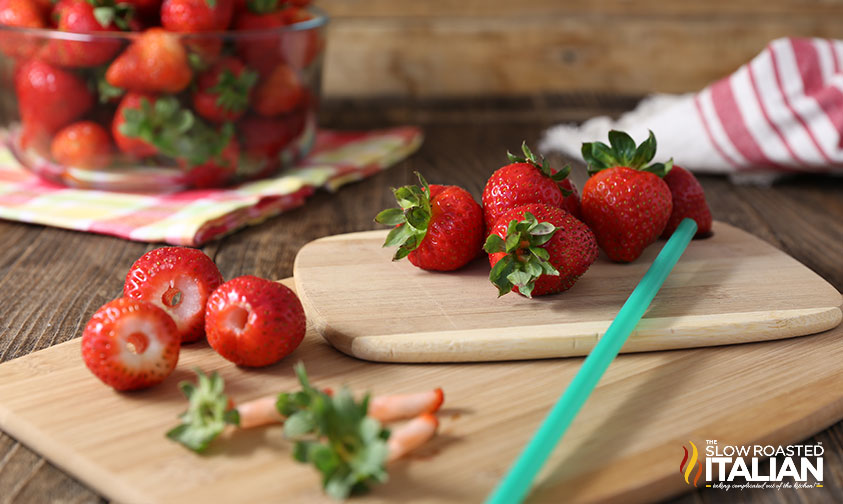 showing how to hull strawberries