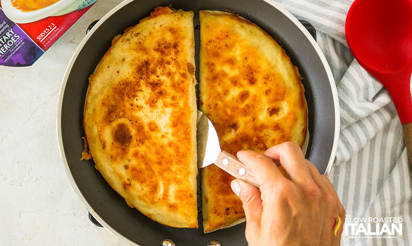 frying mac and cheese quesadillas in a frying pan