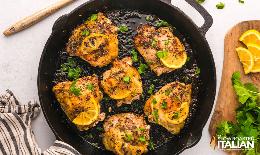 pan seared chicken thighs in a cast iron skillet