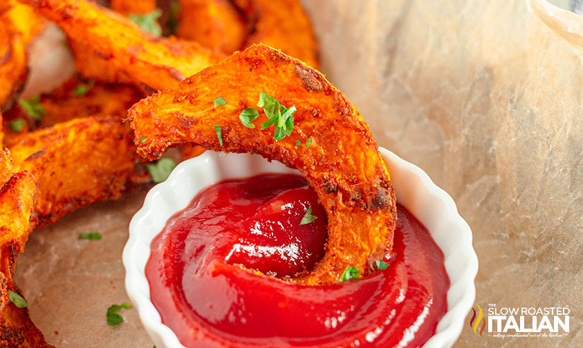 air fryer pumpkin fries dipped in ketchup