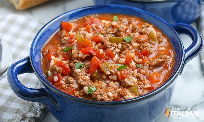 stuffed pepper soup with rice in blue soup crock