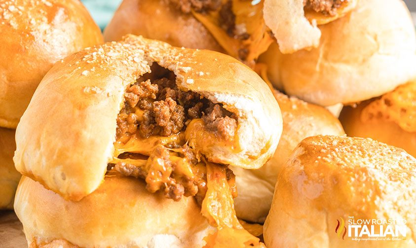 close up: sloppy joe bomb split open with filling oozing out